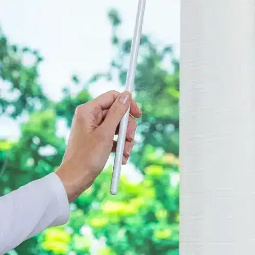 Flexible window blind control wand for easy adjustments and sunlight management at Superior Blinds.