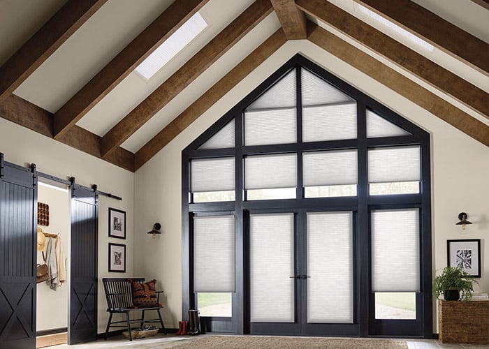 Ballistic door blinds in a modern home interior, premium window coverings, custom window blinds for large windows, superior blinds for stylish home decor, high-quality window treatments for enhanced privacy and light control.