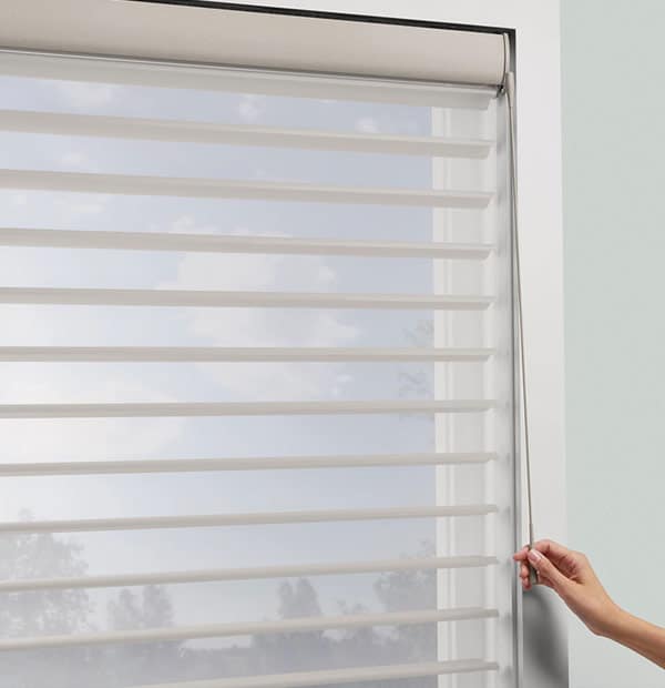 Light-filtering zebra blinds with cordless operation for easy sunlight control and privacy.