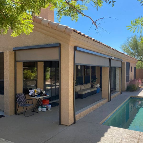 Custom retractable window and patio shades by Superior Blinds to enhance privacy and control sunlight. Perfect for outdoor living areas and residential spaces, offering style and durability.
