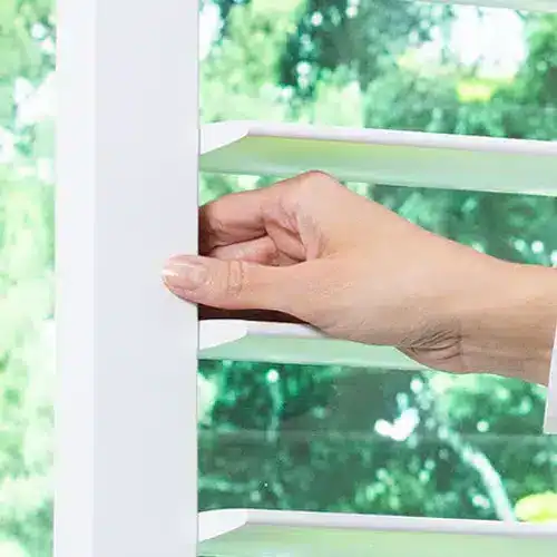 Precision window blind installation with adjustable louvers for optimal light control and privacy. Perfect for enhancing your home ambiance with superior blinds from Superior Blinds.