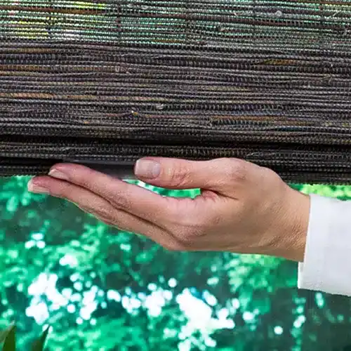 Elegant brown woven wood window blinds showcasing natural materials and craftsmanship by Superior Blinds. Perfect for enhancing home decor with stylish, durable window coverings.