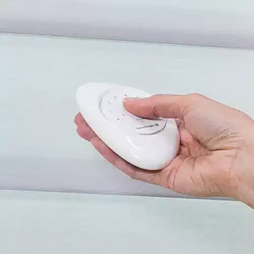 Portable remote control device for adjusting superior blinds in home or office settings, showcasing ease of operation and modern design.