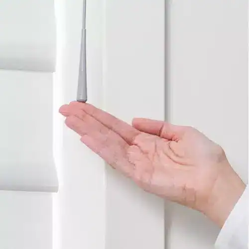 Smooth white window blinds operated with a small screwdriver for effortless adjustment. Perfect for enhancing natural light control and privacy in any room. Easy customization and stylish design from Superior Blinds.