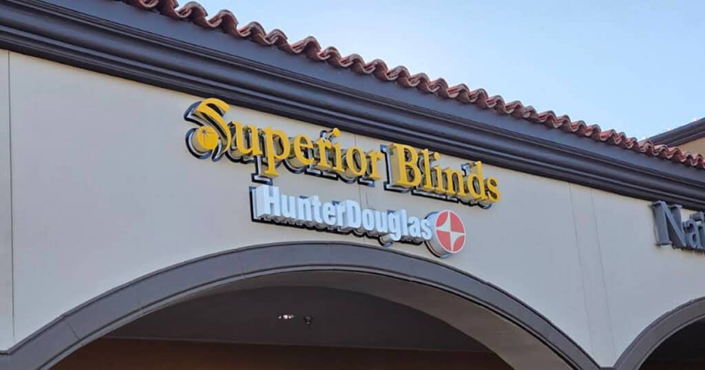 Superior Blinds and Hunter Douglas storefront sign at the Scottsdale showroom